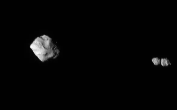 This image shows the asteroid Dinkinesh and its satellite as seen by the Lucy Long-Range Reconnaissance Imager (L’LORRI) as NASA’s Lucy Spacecraft departed the system. This image was taken at 1 p.m. EDT (1700 UTC) Nov. 1, 2023, about 6 minutes after closest approach, from a range of approximately 1,010 miles (1,630 km). From this perspective, the satellite is revealed to be a contact binary, the first time a contact binary has been seen orbiting another asteroid.